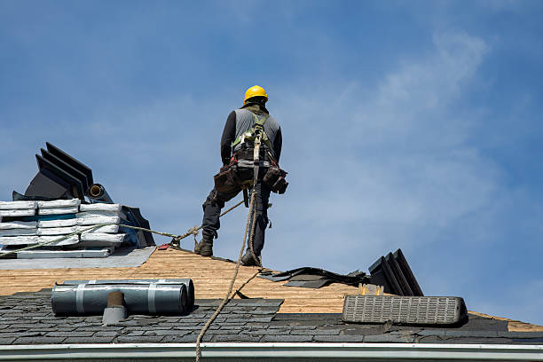 Professional Roof Replacement technician working in East Baldwin, ME
